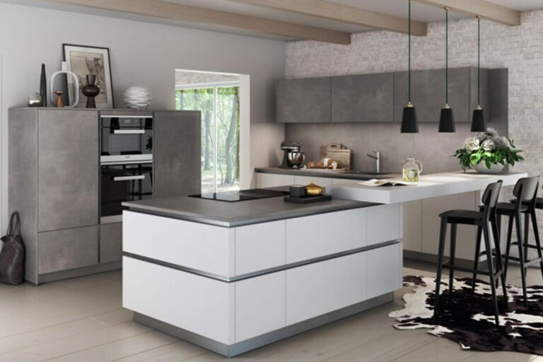 Artego Küche „Turin“: Grifflos, Betonoptik und weiße Fronten in modernem Design.