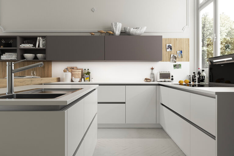 Moderne, grifflose Artego-Küche in verschiedenen Grautönen mit klaren Linien und zeitlosem Design.