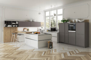 Moderne, grifflose Küche in verschiedenen Grautönen mit klaren Linien und zeitlosem Design von Artego.