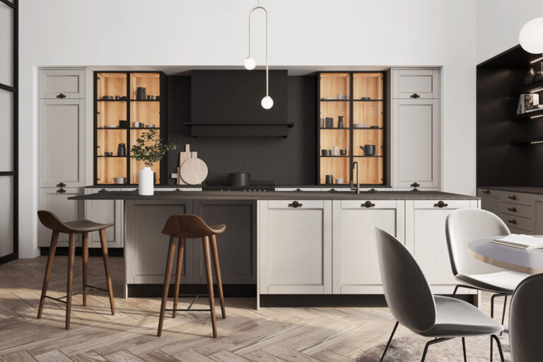 Inselküche Ergo FL Zero in Beach Grey mit ergonomischem Extended-Top, naturholz-innenen Schrankrückseiten und urbanem Landhauscharme.